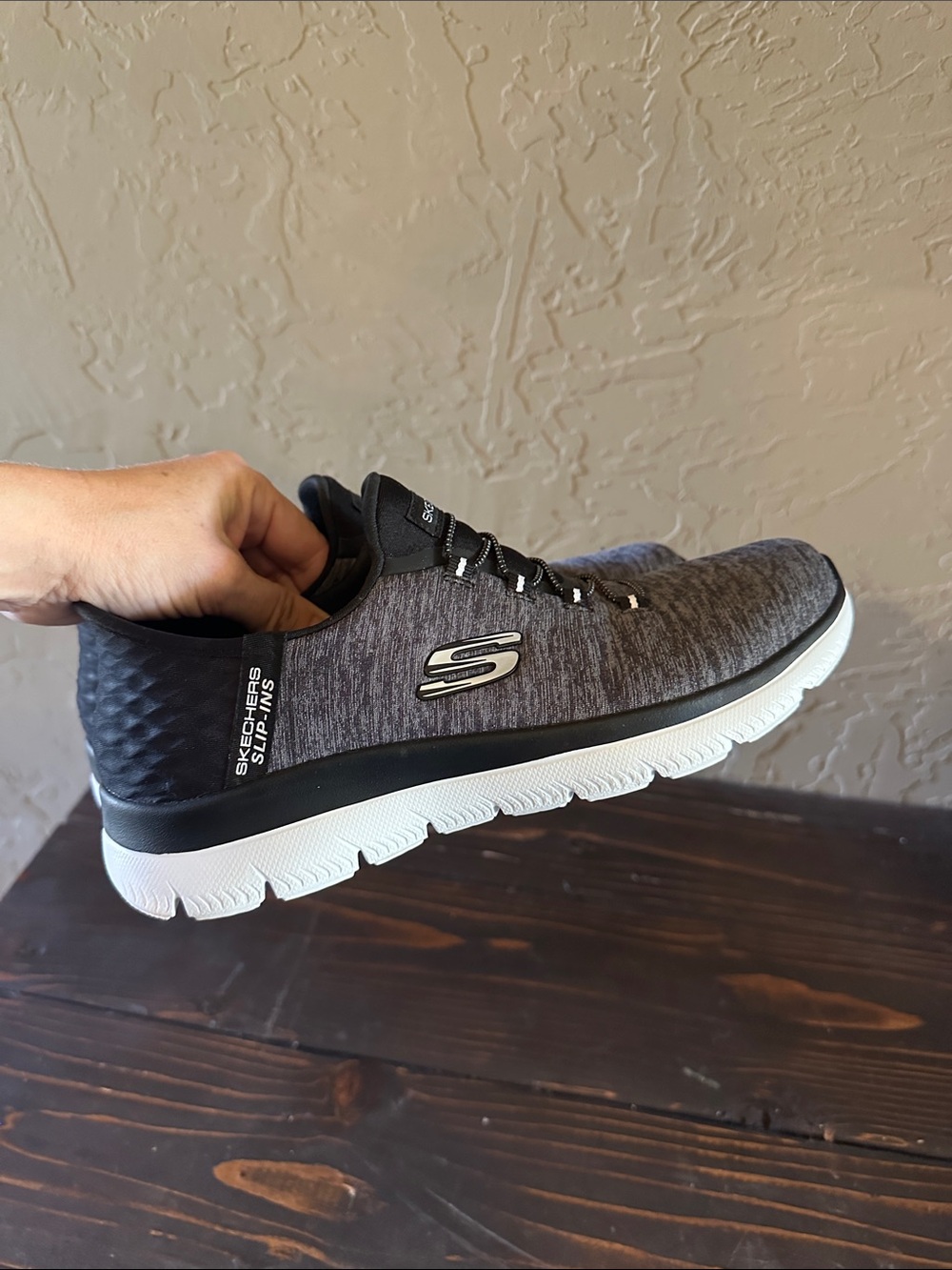 Skechers slip and black and gray tennis shoes size women’s 7.5